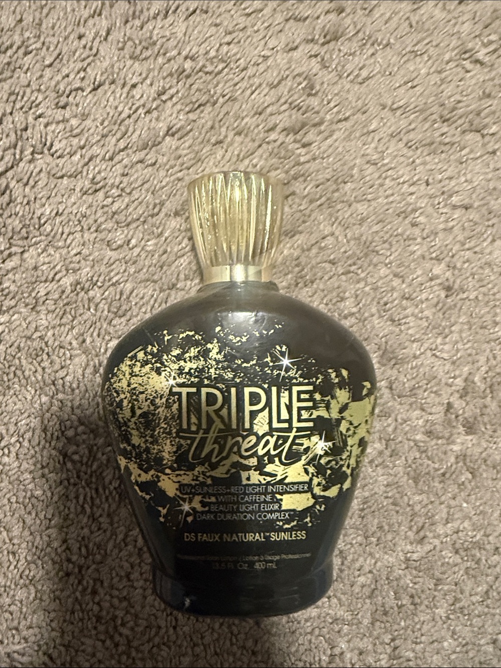 Triple threat tanning lotion